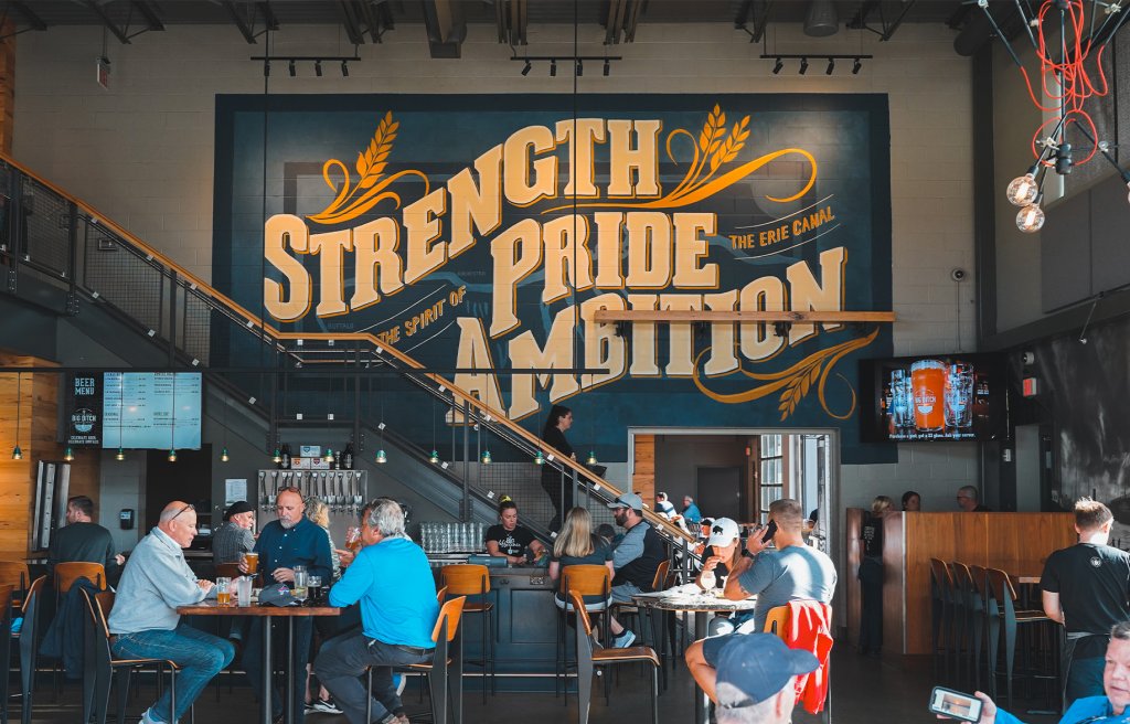 Big Ditch Brewing-Interior Mural reading Strength Pride Ambition
