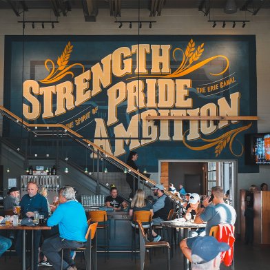 Big Ditch Brewing-Interior Mural reading Strength Pride Ambition