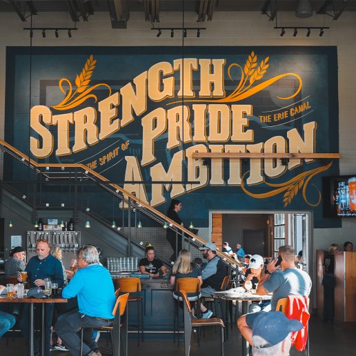 Big Ditch Brewing-Interior Mural reading Strength Pride Ambition