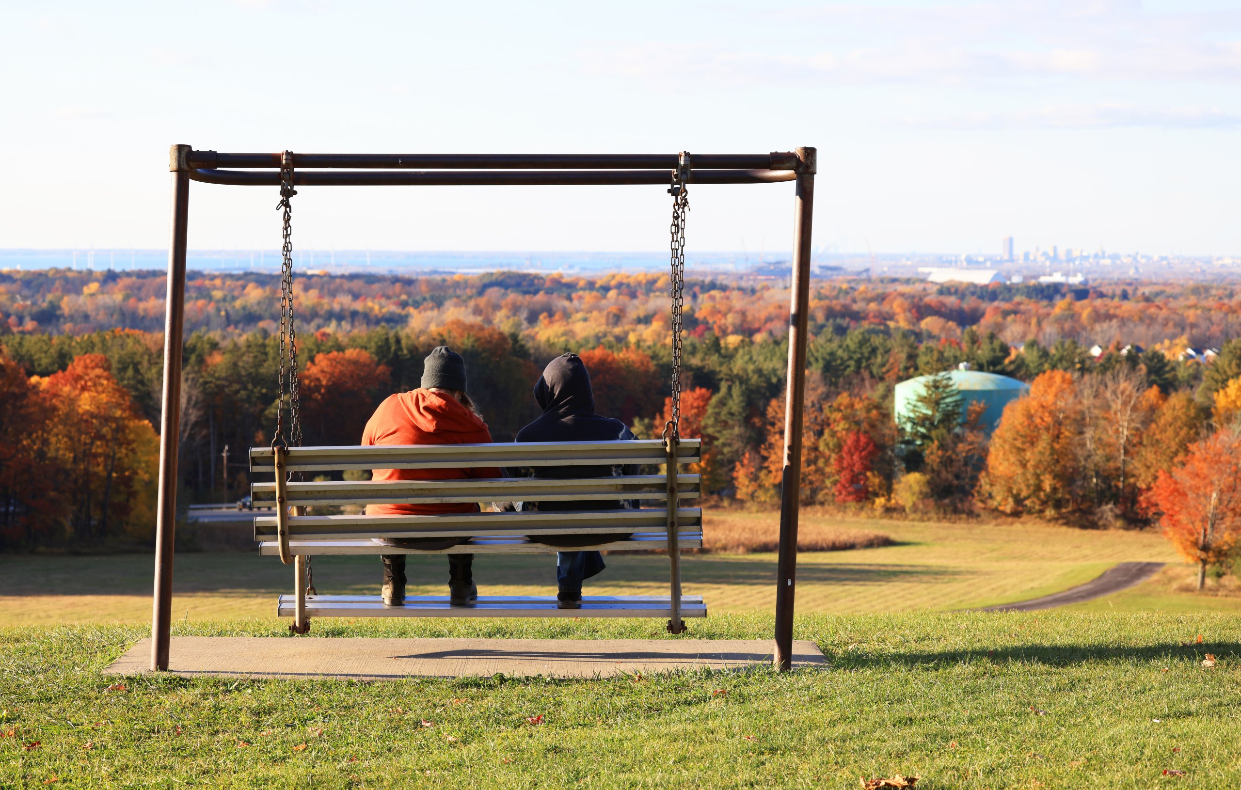 Swings at the top of the sledding hill at Chestnut Ridge Park in Orchard Park, provide a a beautiful view of the valley filled with fall color, Thursday October 24, 2024. Photo by Sharon Cantillon