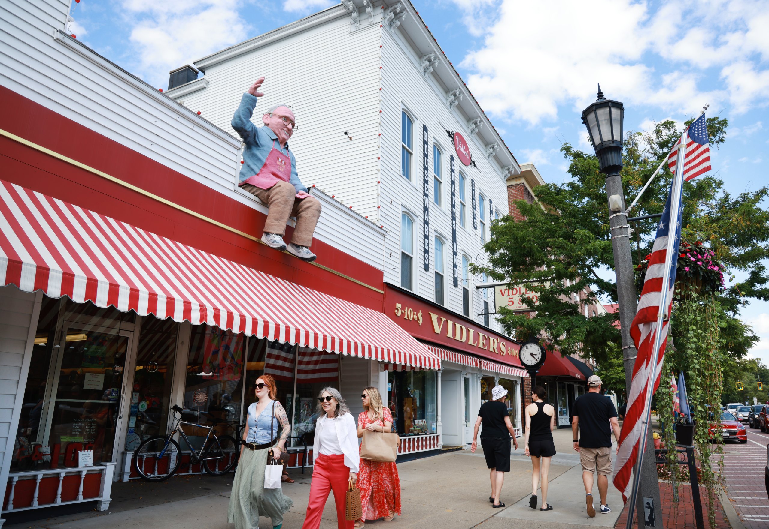 The iconic statue of Vidler’s 5 &amp; !0 late patriarch Ed Vidler appears to greet passersby in front of the store on Main St. East Aurora, Sunday, September 1, 2024. The 10-foot statue weighs 500-600 lbs. Vidler’s 5 &amp; 10 opened in 1930. Photo by Sharon Cantillon